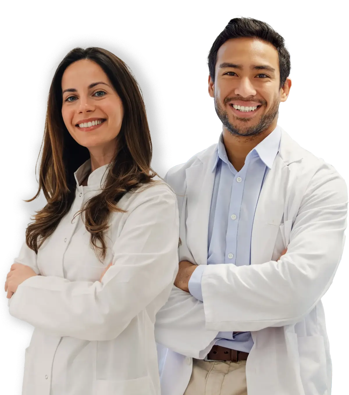 Two dentists in white coats, arms crossed, smiling